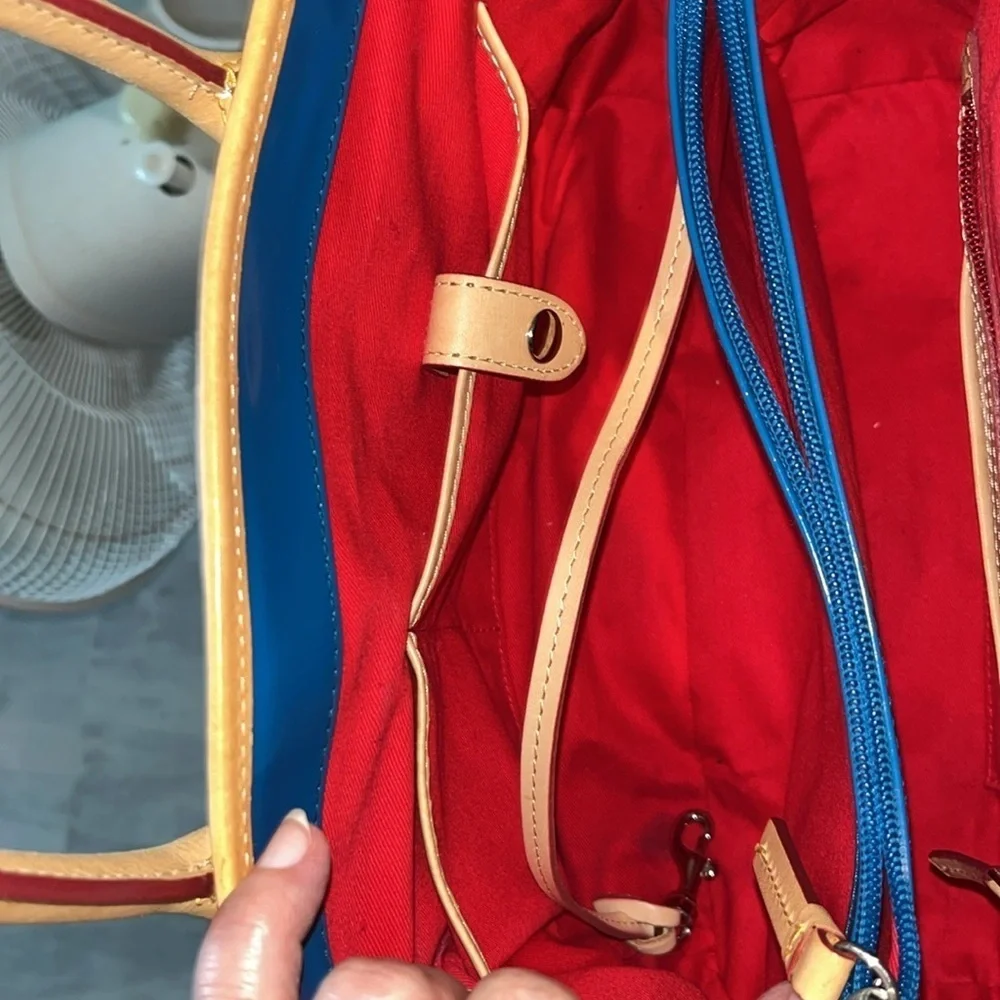 Dooney & Bourke  Satchel  Royal blue coated canvas/ tan leather trim   Like New